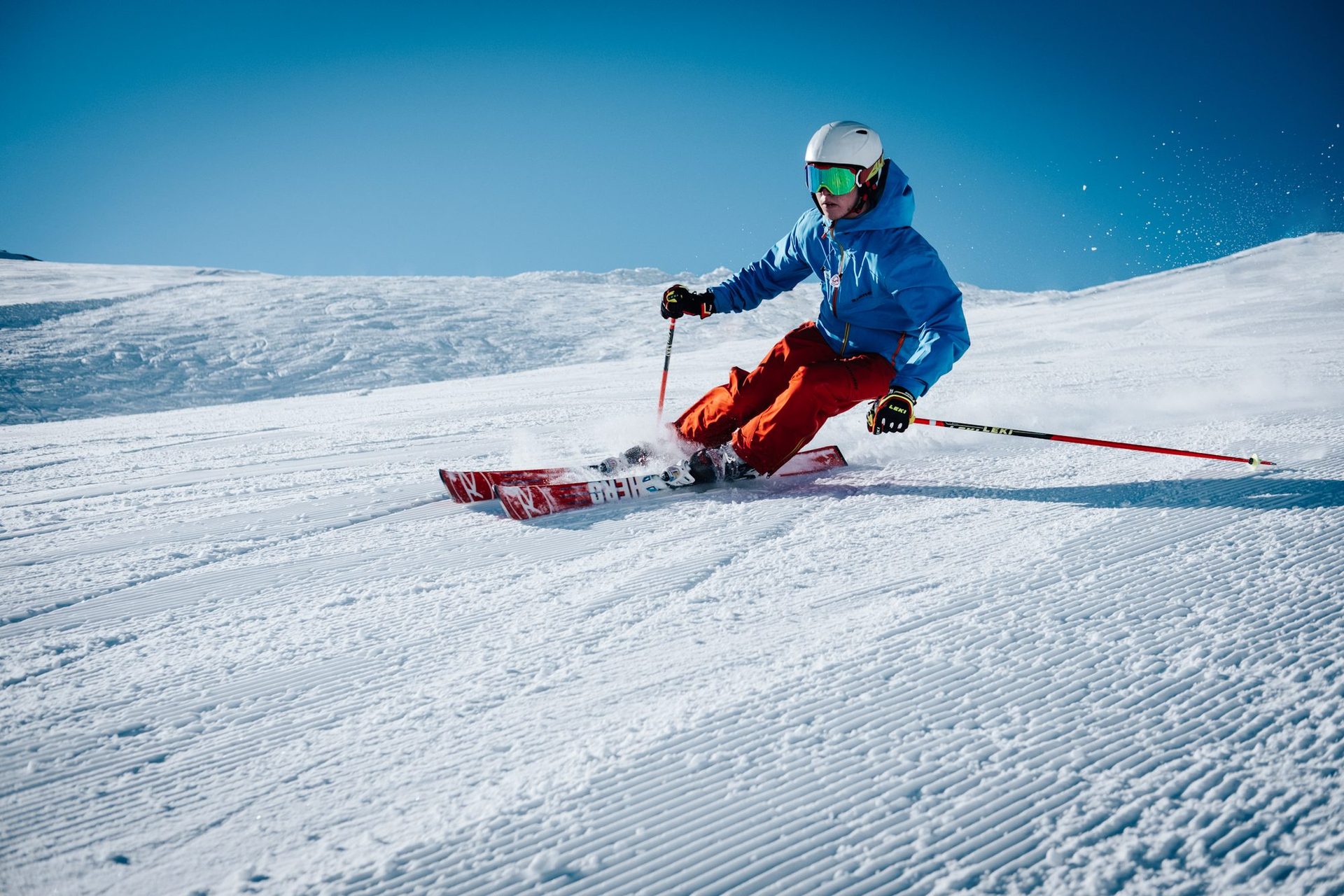 A Snowtailors instructor with a family on Saulire, Courchevel